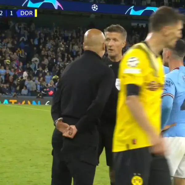 WATCH: Pep Guardiola brandished yellow card after the match and then hugs referee