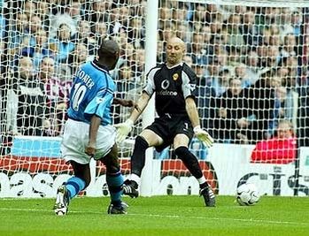 Shaun Goater slots the ball past Man United keeper Fabien Barthez.