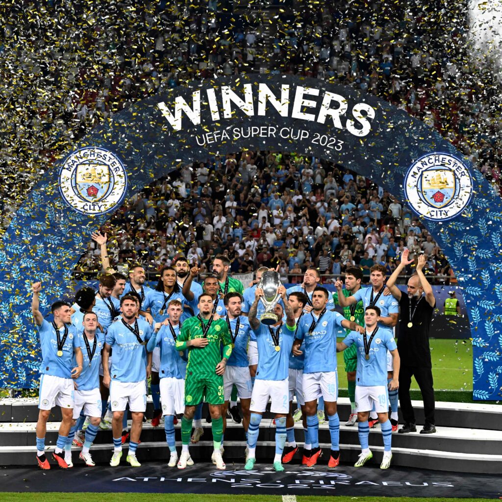 This image shows Man City lifting the UEFA Super Cup in Athens.