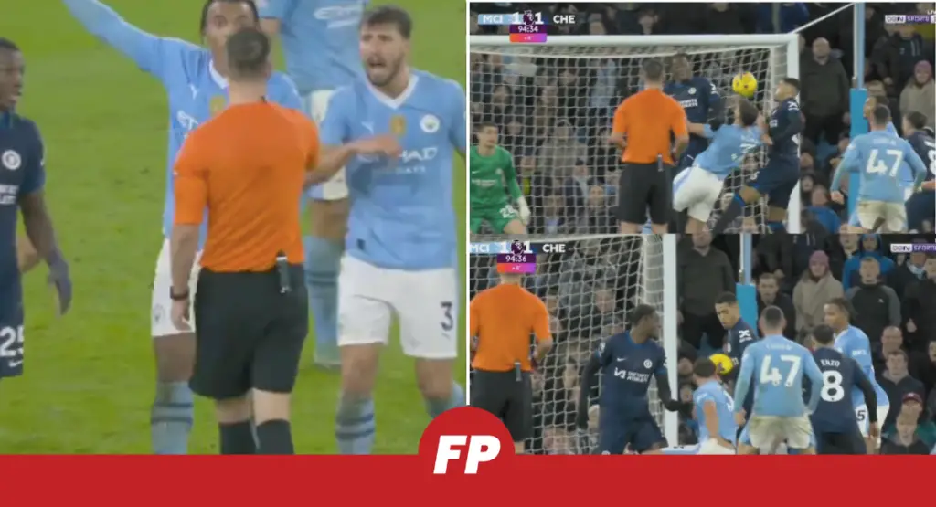 Man City and Chelsea players surround the referee over late handball VAR drama.
