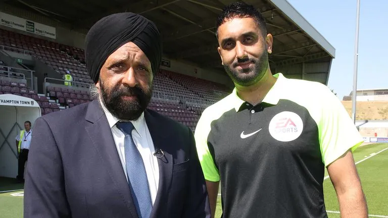 Sunny Singh Gill is pictured here with his father, Jarnail Singh, whose footsteps he is following in as a professional referee.