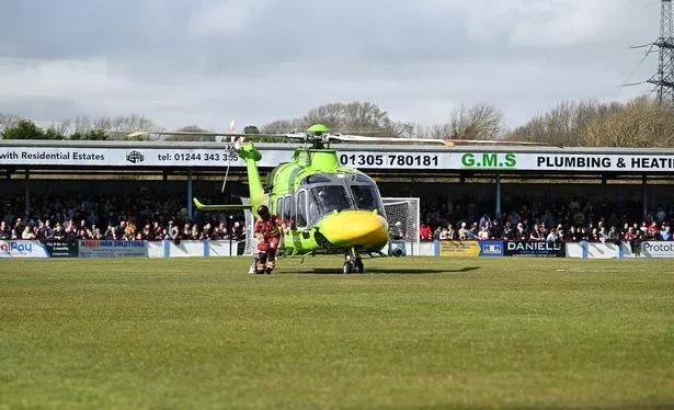 The air ambulance crew landed on the pitch during Weymouth vs Yeovil Town after a supporter suffered a medical emergency.