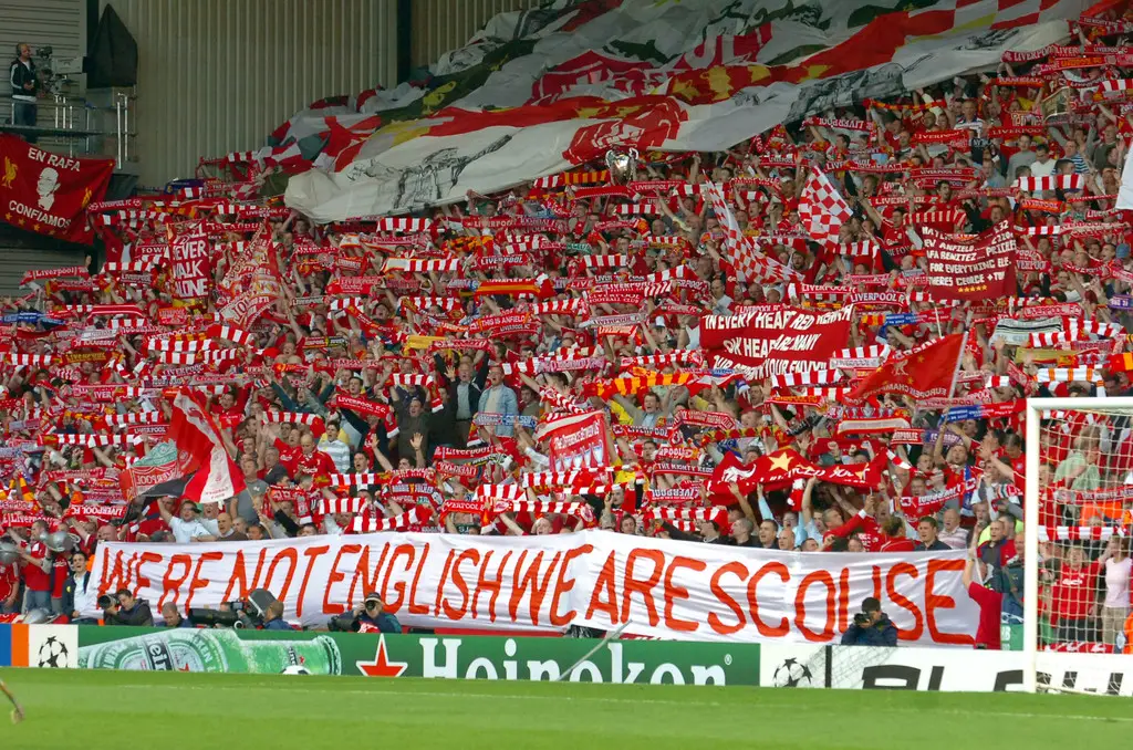 Liverpool fans protest in the Kop end.